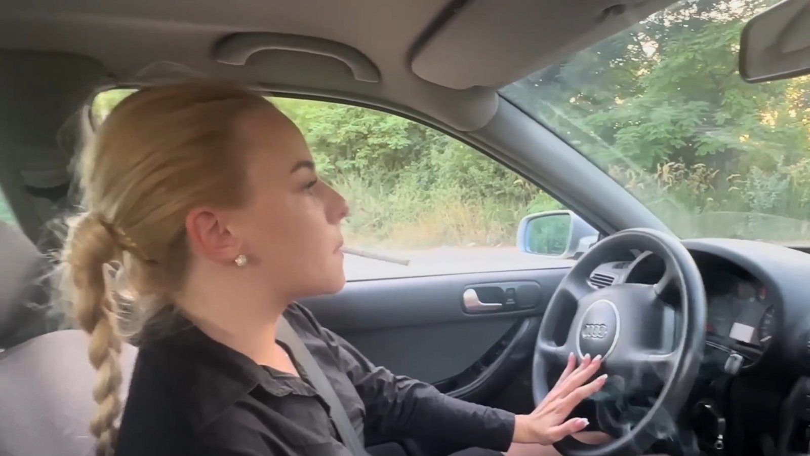 Smoking and driving in messy car Nastya